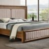amber teak wood king size bed in Hyderabad with upholstered headboard